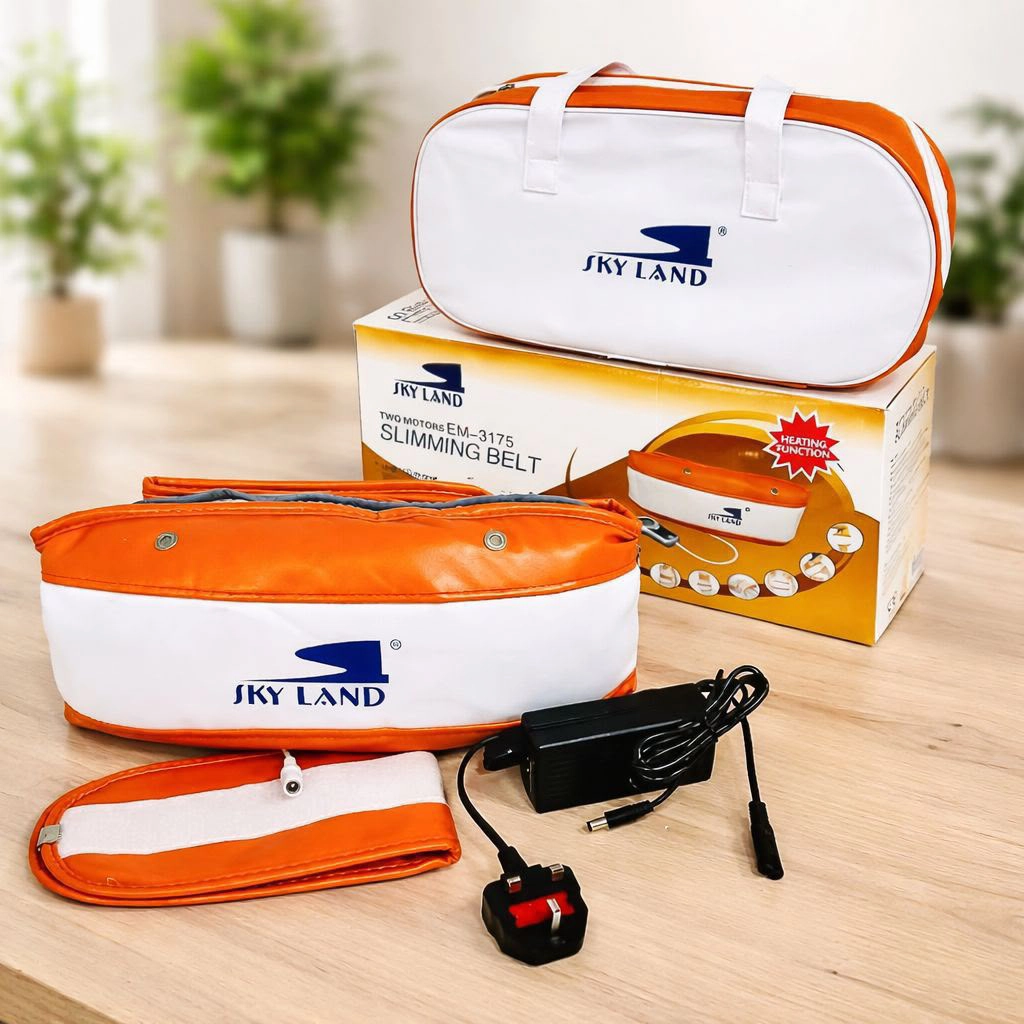 SKY LAND EM-3175 electric slimming belt set with abdominal belt, arm belt, carry bag, power adapter, and retail box displayed in a modern home setting.