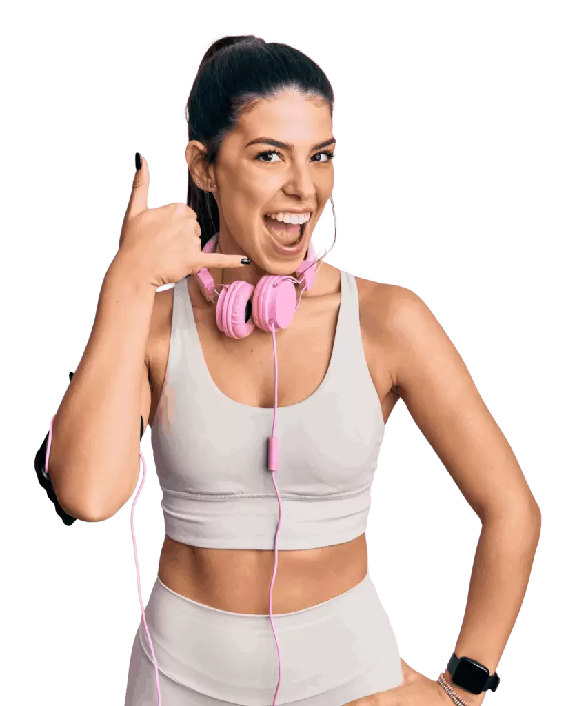 Smiling fitness woman wearing workout apparel and pink headphones making a call gesture, representing friendly fitness support.